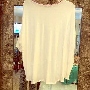 White T-shirt with pink and green neckline